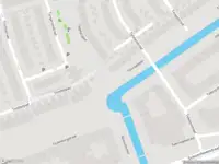 Ambulance met gepaste spoed naar de Ravensteinstraat in Amsterdam