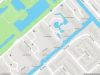 Ambulance met gepaste spoed naar de Middenwetering in Krimpen aan den IJssel