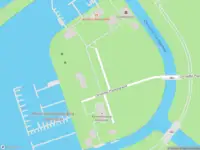 Ambulance met grote spoed naar de Christoffel Plantijngracht in Amsterdam