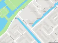Ambulance met gepaste spoed naar de Scheepvaart in Krimpen aan den IJssel