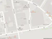 Ambulance met grote spoed naar de Gedempt Hamerkanaal in Amsterdam
