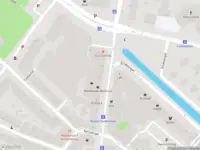 Ambulance met grote spoed naar de Bergse Dorpsstraat in Rotterdam