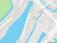 Ambulance met gepaste spoed naar de Bergse Linker Rottekade in Rotterdam