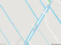 Politie naar de Noordpolderweg in Muiden vanwege aanrijding met letsel
