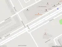 Ambulance met grote spoed naar de Karspeldreef in Amsterdam