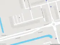 Ambulance met gepaste spoed naar de Edmond Hellenraadstraat in Rotterdam