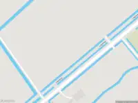Politie naar de Lageweg in Ossenzijl vanwege voertuigen te water