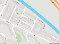 Brandweer met gepaste spoed naar de Grootslagstraat in Amsterdam vanwege een buitenbrand