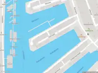 Ambulance met grote spoed naar de Jufferkade in Rotterdam