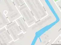 Ambulance met grote spoed naar de Gruttosingel in Capelle aan den IJssel