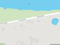Ambulance met grote spoed naar de Zuiderlingedijk in Spijk