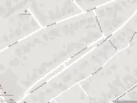 Brandweer met gepaste spoed naar de Stationstraat in Beek