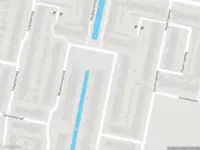 Ambulance met gepaste spoed naar de Meezenbroekstraat in Rotterdam