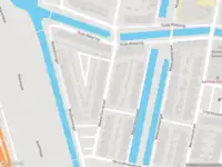 Ambulance met grote spoed naar de Westerflierstraat in Rotterdam