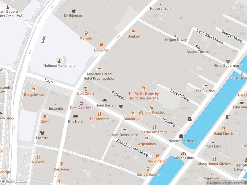 Ambulance met gepaste spoed naar de Pijlsteeg in Amsterdam