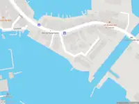 Ambulance met gepaste spoed naar de Grote Sluis in Spaarndam