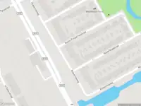 Ambulance met gepaste spoed naar de Kleine Pimpernelstraat in Amsterdam