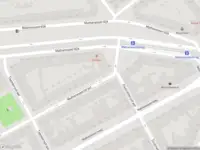 Ambulance met gepaste spoed naar de Mathenesserstraat in Rotterdam