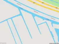 Ambulance met grote spoed naar de Julianastraat in Alphen aan den Rijn