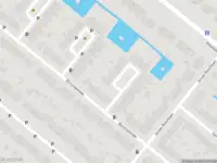 Ambulance met grote spoed naar de Bergplein in Rotterdam