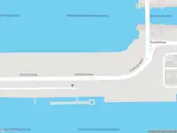 Ambulance met gepaste spoed naar de Koningin Wilhelminakade in IJmuiden