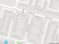 Ambulance met gepaste spoed naar de Plaatwerkerstraat in Amsterdam