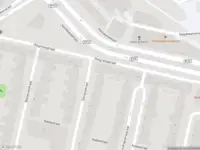 Ambulance met gepaste spoed naar de Dempostraat in Rotterdam