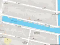 Ambulance met gepaste spoed naar de Prinsengracht in Amsterdam