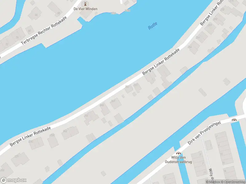 Ambulance met gepaste spoed naar de Bergse Linker Rottekade in Rotterdam