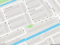 Ambulance met gepaste spoed naar de Huis te Merwestraat in Schiedam
