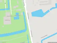 Brandweer met gepaste spoed naar de Oud Pernisseweg in Pernis Rotterdam vanwege stormschade