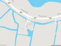 Ambulance met gepaste spoed naar de Waterlandse Zeedijk in Uitdam