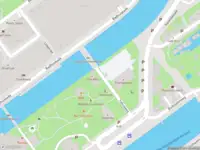 Ambulance met gepaste spoed naar de Tolhuisweg in Amsterdam