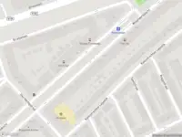 Brandweer met gepaste spoed naar de Bas Jungeriusstraat in Rotterdam
